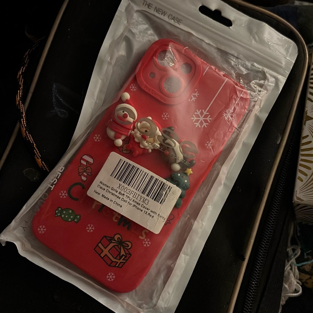 New. Never used iPhone 13 Christmas Phone Case